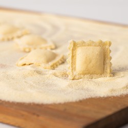 Ravioli con queso de cabra, ricotta y hierbas silvestres